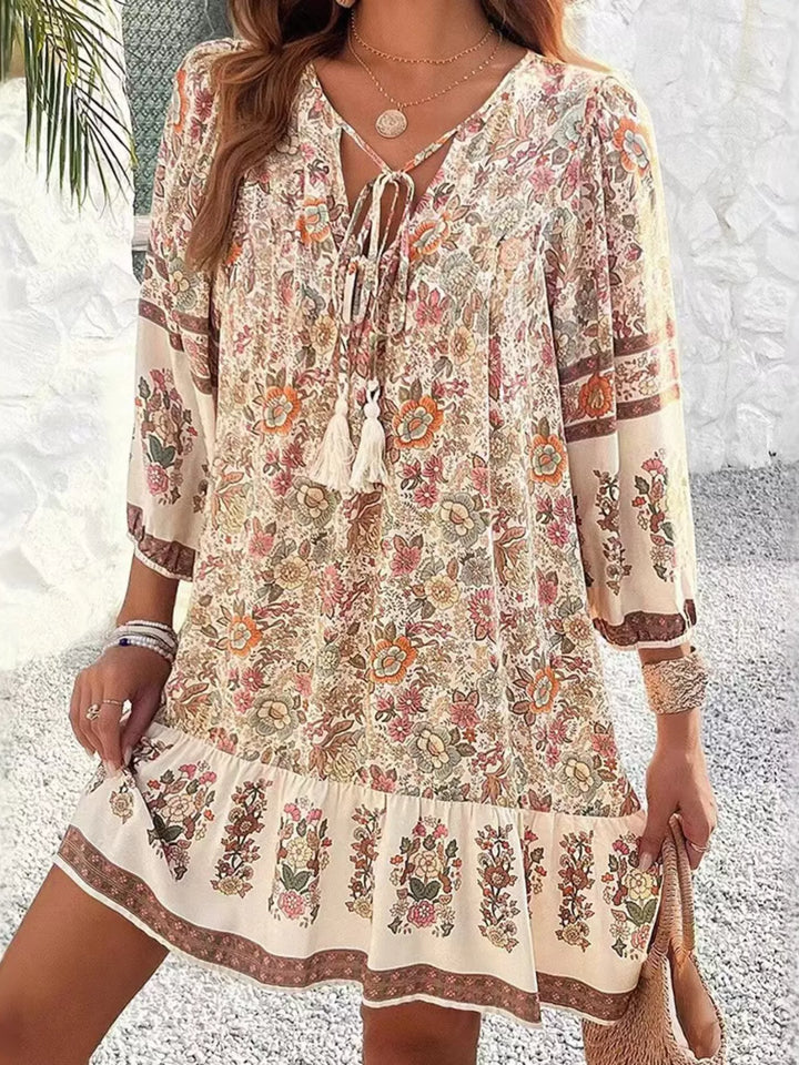 Tan Boho floral v-neck mini dress with tassel tie and long sleeves