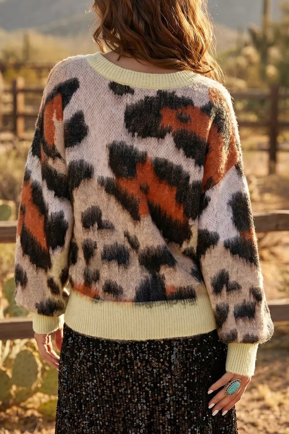 Fuzzy leopard print drop shoulder crew neck sweater