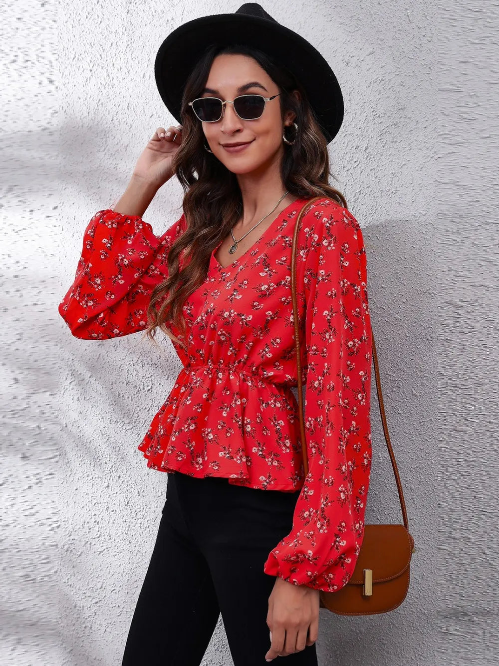 Floral peplum blouse with V-neck and balloon sleeves