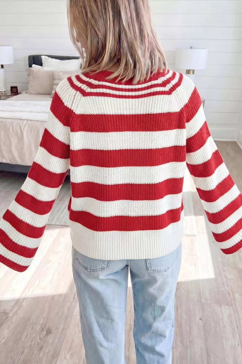 Striped rib knit henley sweater with snap button placket