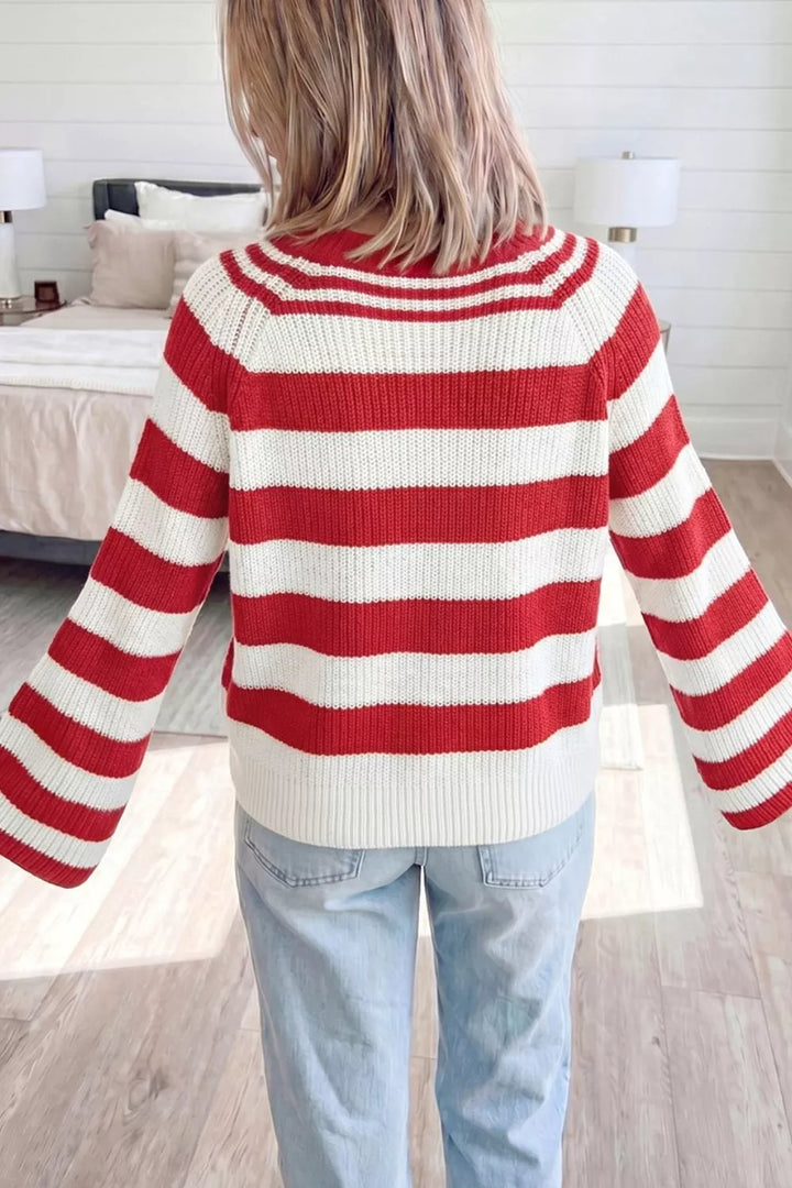 Striped rib knit henley sweater with snap button placket