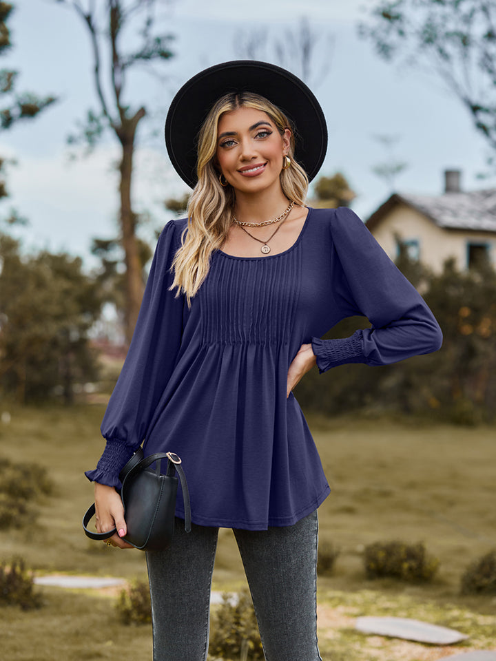 Pintuck pleated puff sleeve blouse with smocked cuffs
