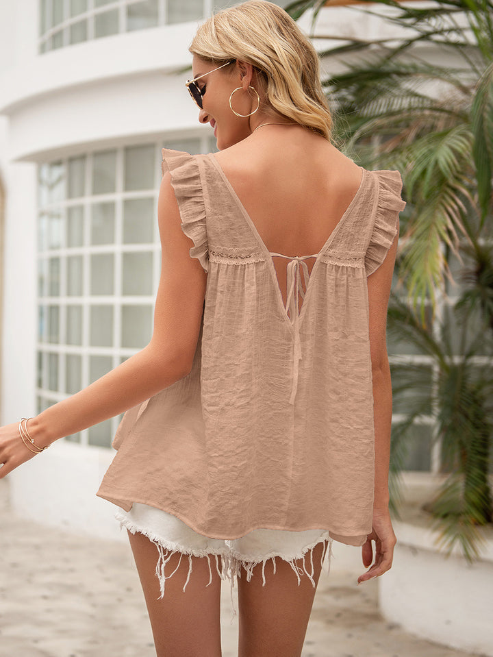 Ruffled cap sleeve V-neck blouse with crochet trim and tie back