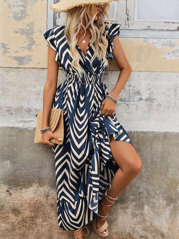 Geometric print midi dress with cap sleeves and smocked waist