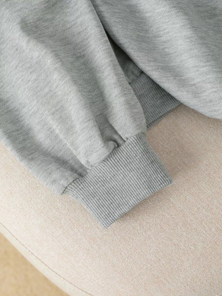 Bow embroidered hoodie with lace trim and front pocket