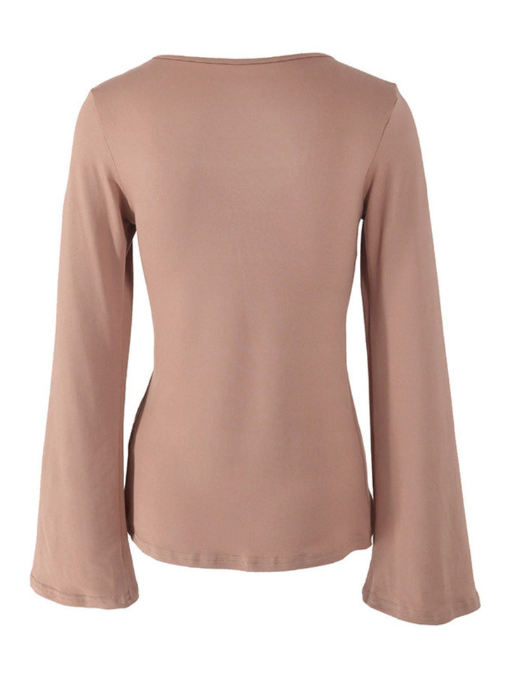 Tie-front long sleeve top with open cascading front