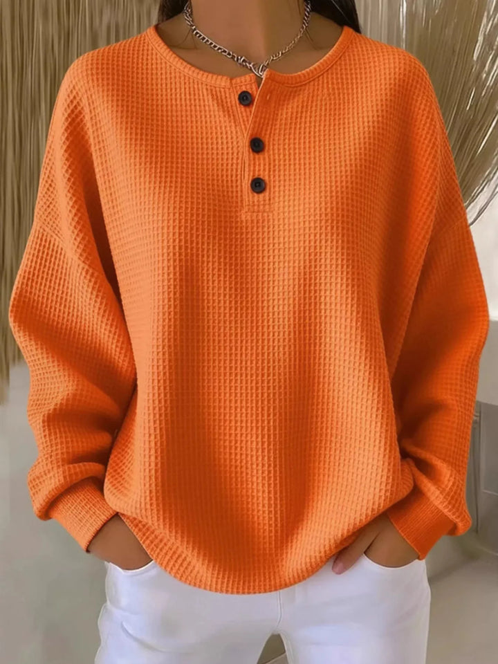 Waffle knit long sleeve henley top with button placket
