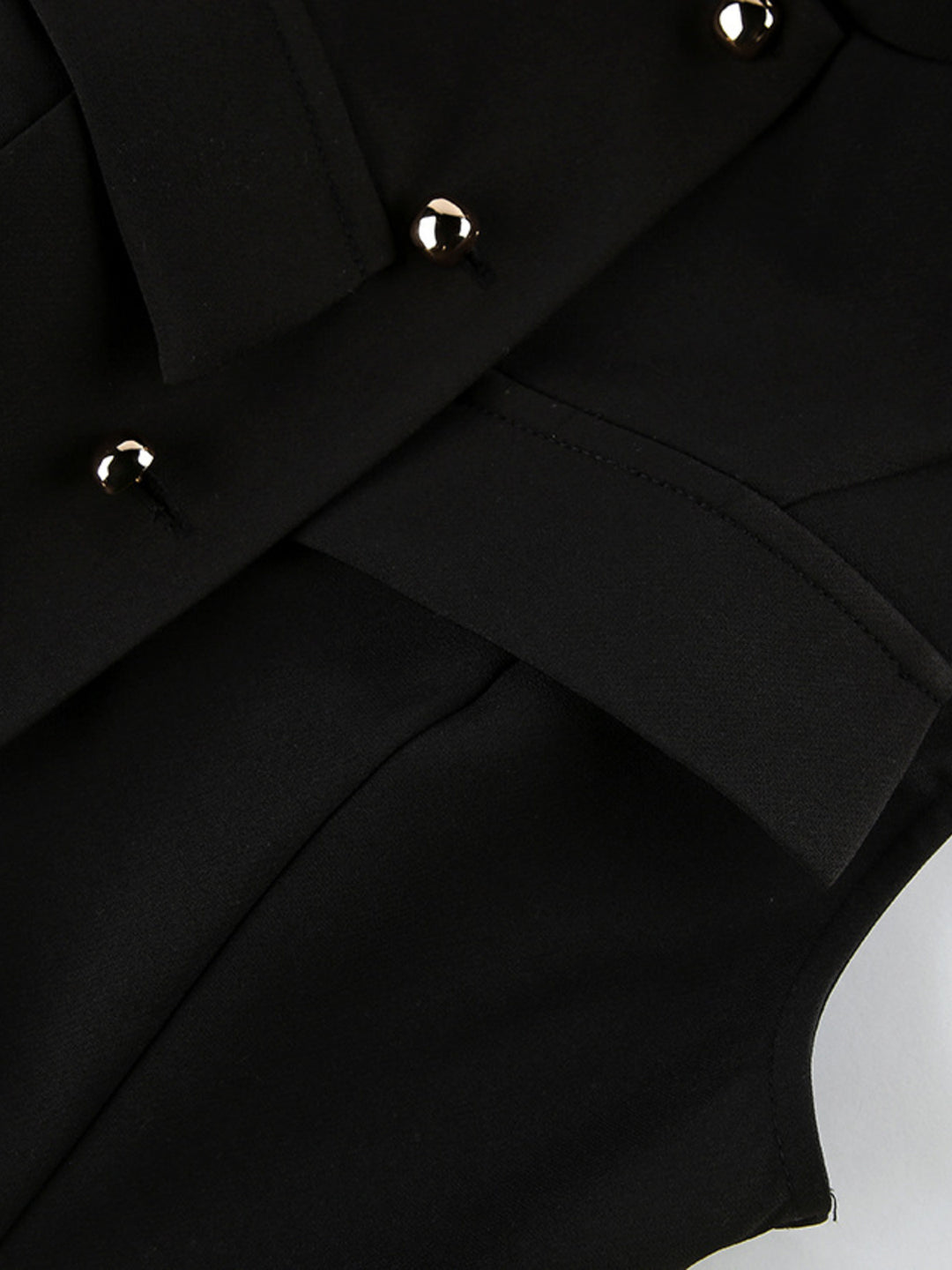 Stand collar sleeveless button-front vest with split hem