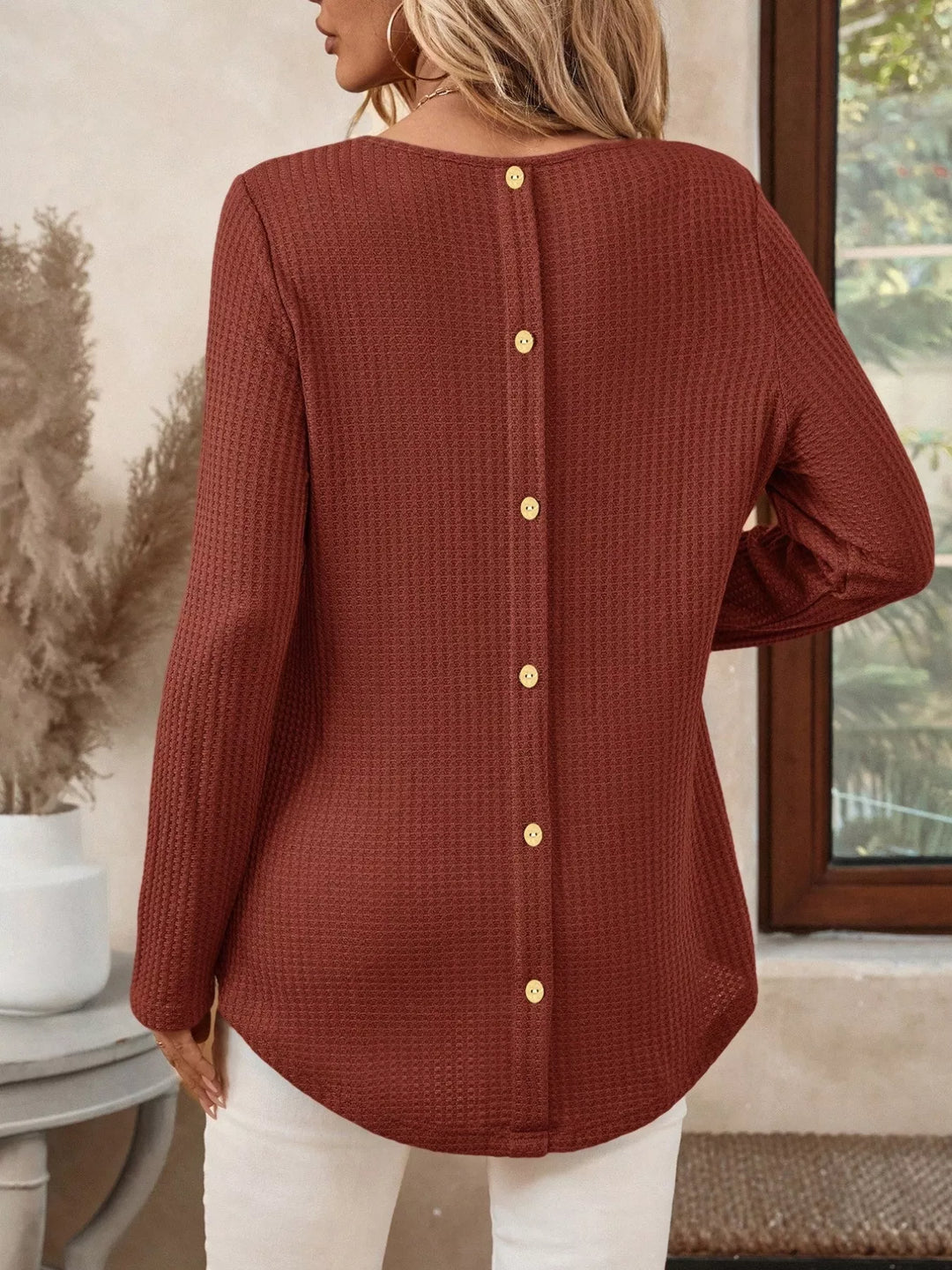 Waffle knit crew neck long sleeve top with curved hem