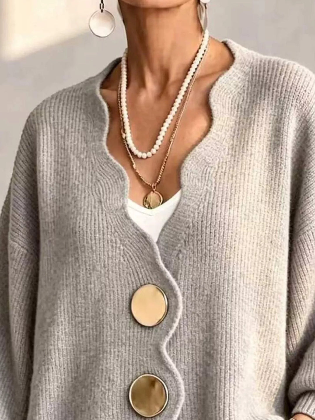 Scalloped-edge ribbed knit oversized button-down cardigan