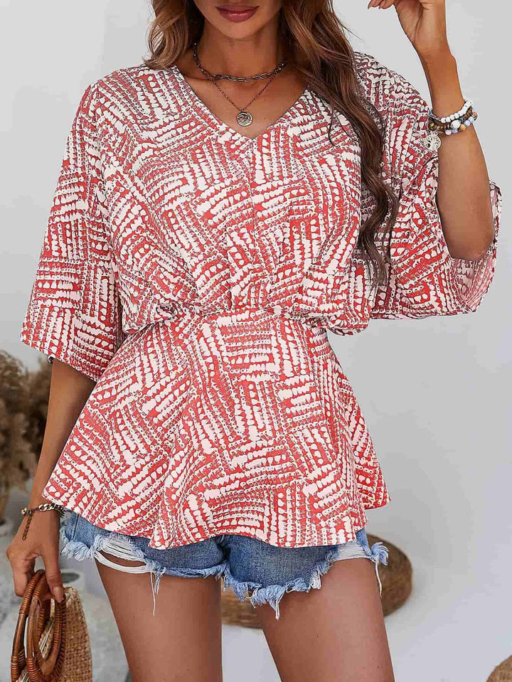 Abstract print V-neck dolman sleeve blouse