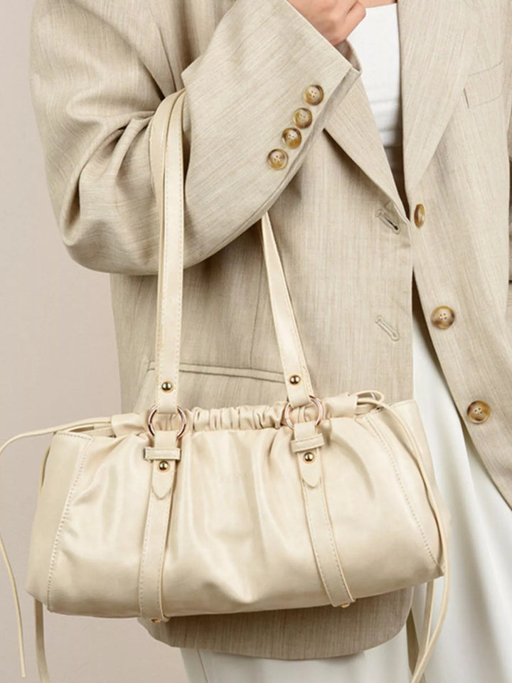 Ruched faux leather shoulder bag with O-ring straps