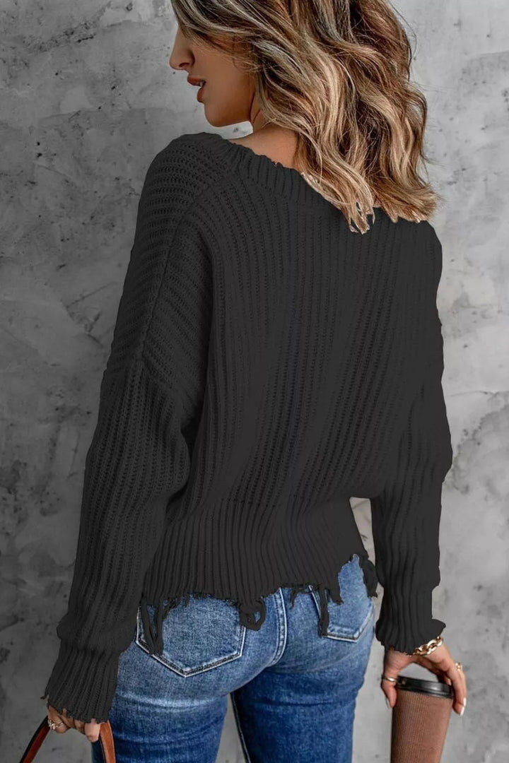 Distressed raw hem ribbed knit V-neck sweater