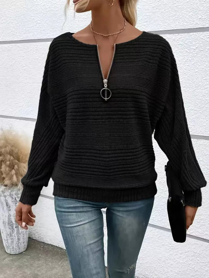 Black Ribbed knit quarter-zip batwing sweater with O-ring pull