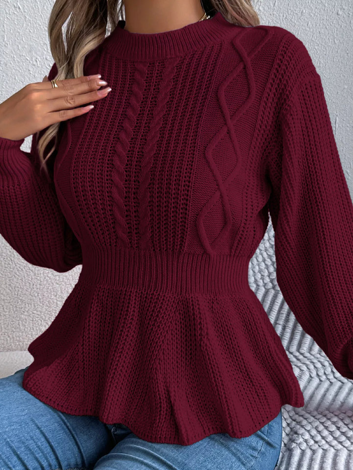Cable knit peplum sweater with mock neck