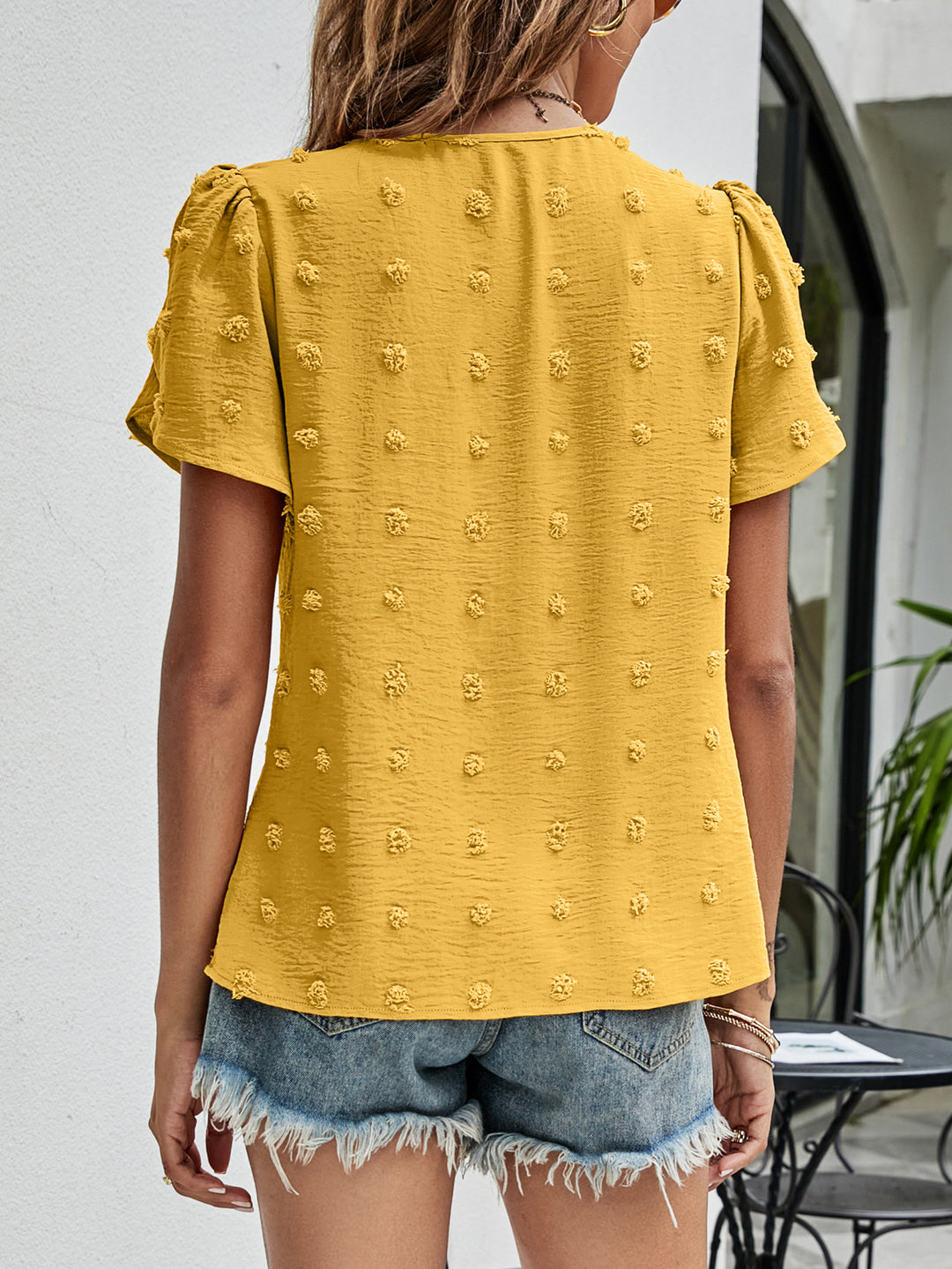 Swiss dot petal sleeve top with pleated round neck