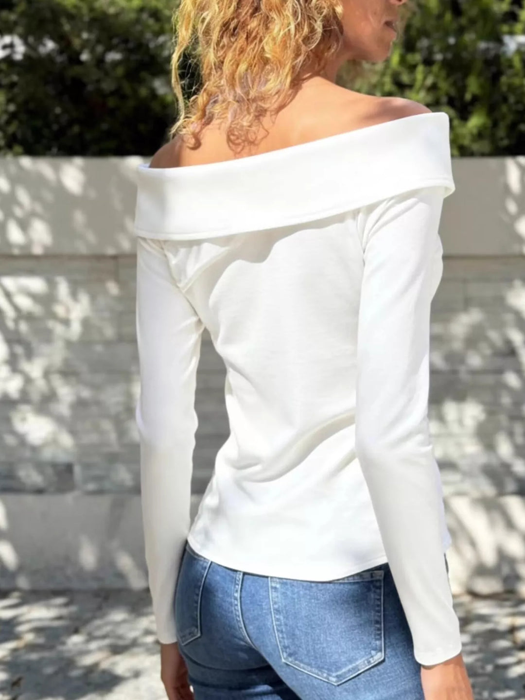 Off-shoulder long sleeve top with gold button trim