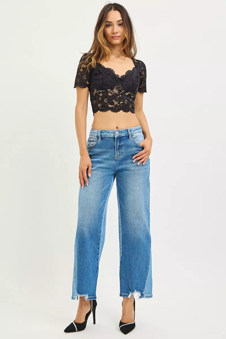Slouchy cropped barrel-leg jeans with contrast wash and raw hem