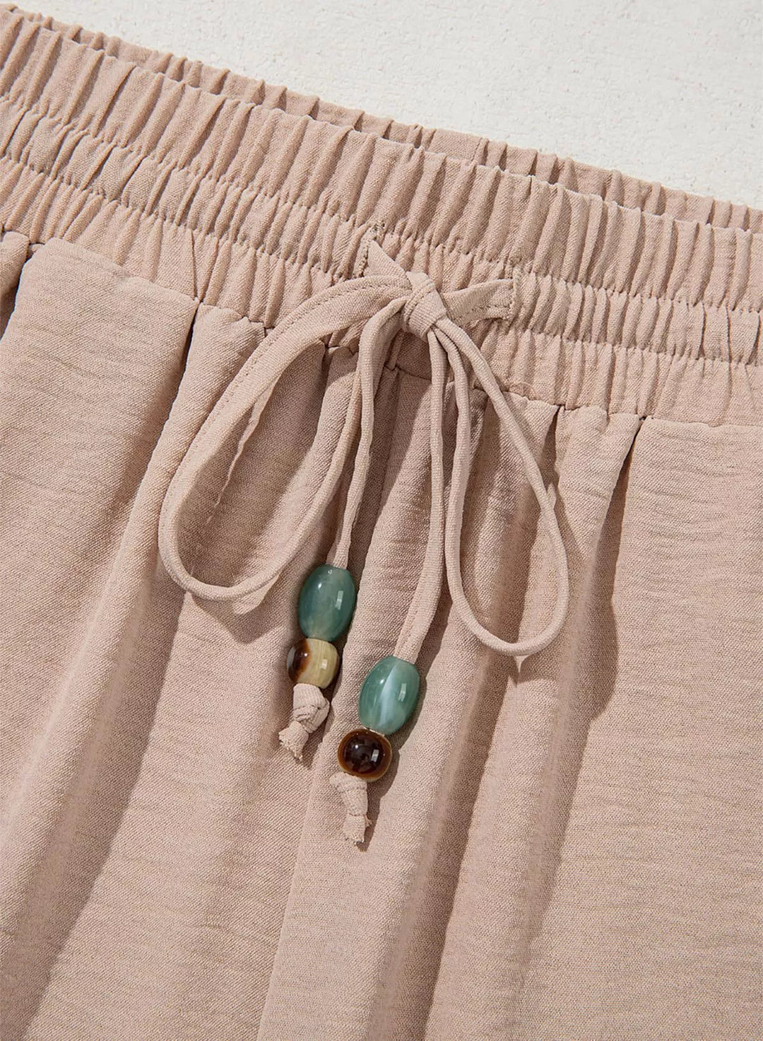 Wide leg drawstring pants with embroidered lace hem