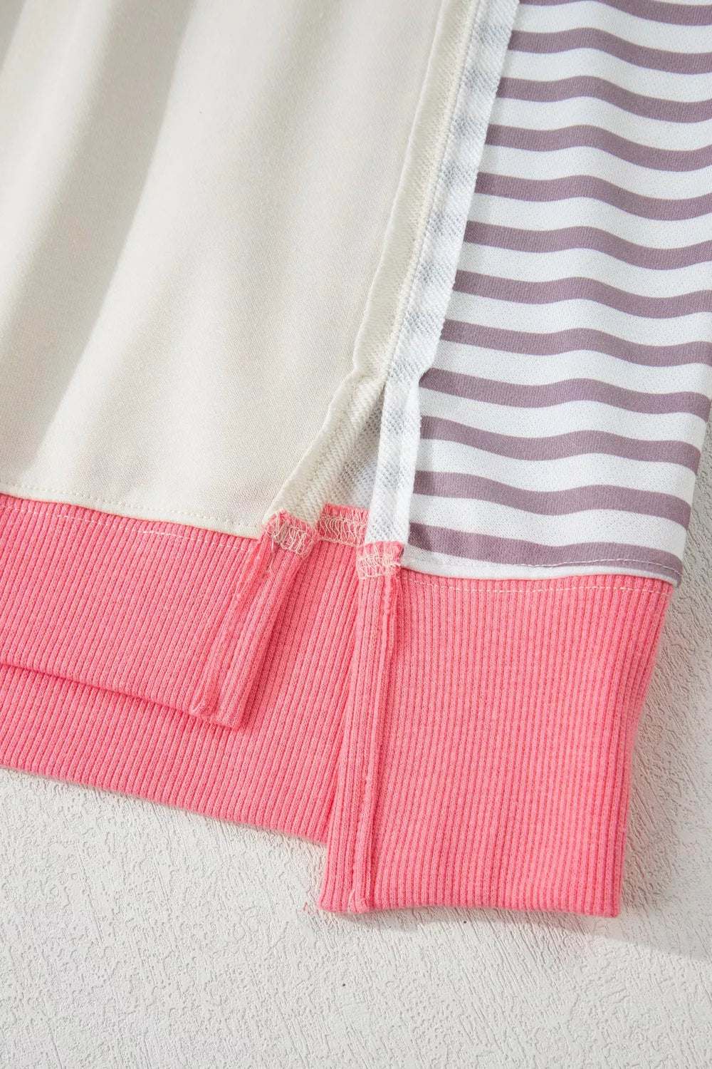 Color block striped dolman sweatshirt with side slit