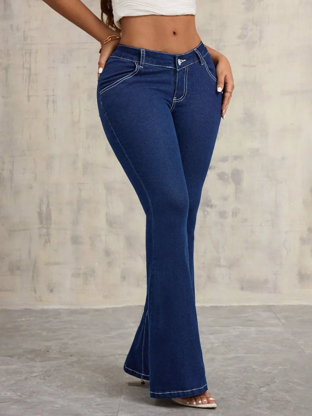 V-notch waist flare jeans with contrast stitching