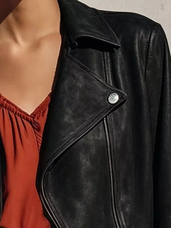 Fringe hem faux leather moto jacket with asymmetrical zip