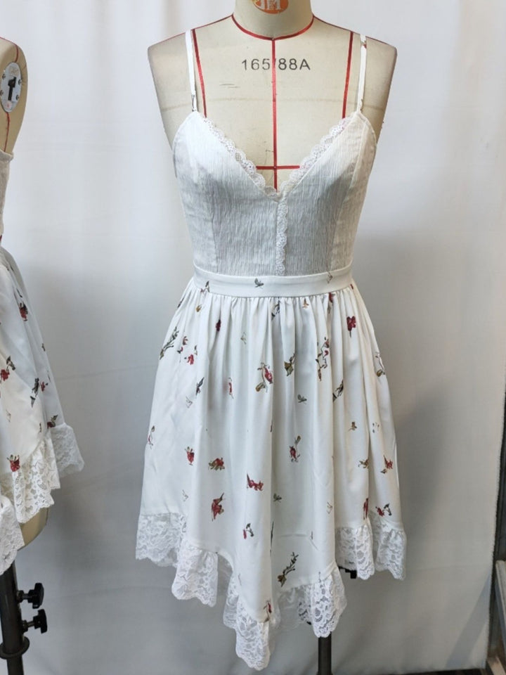 Floral cami dress with lace trim and asymmetrical hem