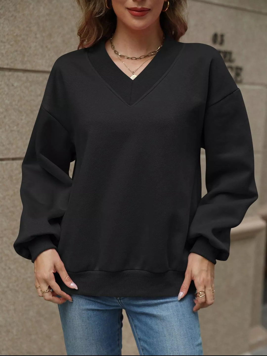 V-neck drop-shoulder pullover sweatshirt with ribbed trim