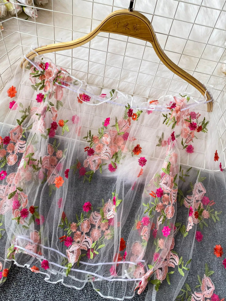 Floral embroidered off-shoulder mesh crop top with puff sleeves