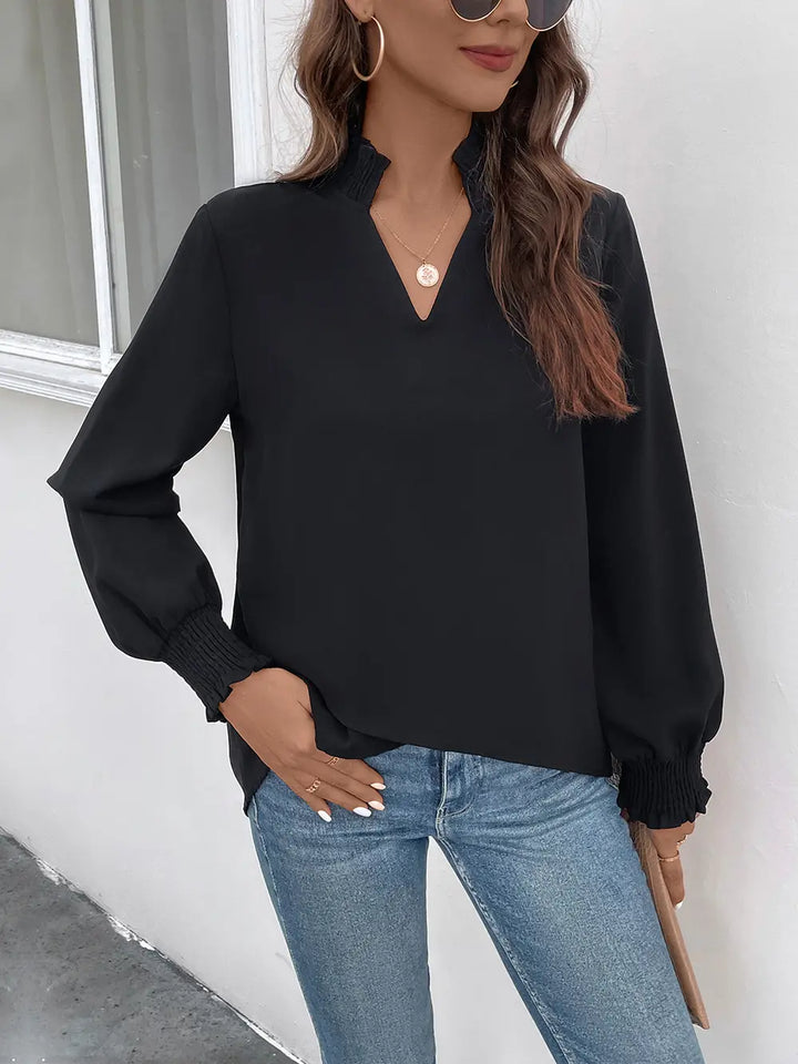 Black Smocked ruffle-cuff notched neck long sleeve blouse