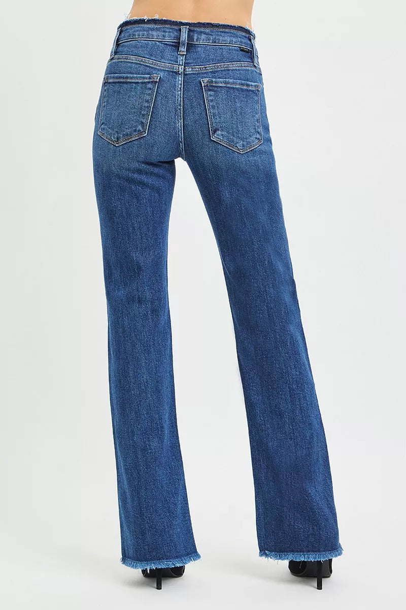 Mid-rise bootcut jeans with frayed waistband and raw hem