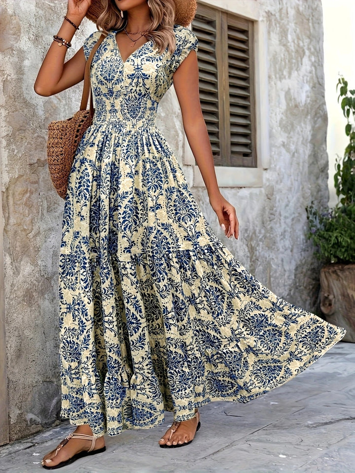 Blue Smocked tiered maxi dress with cap sleeves and side slit