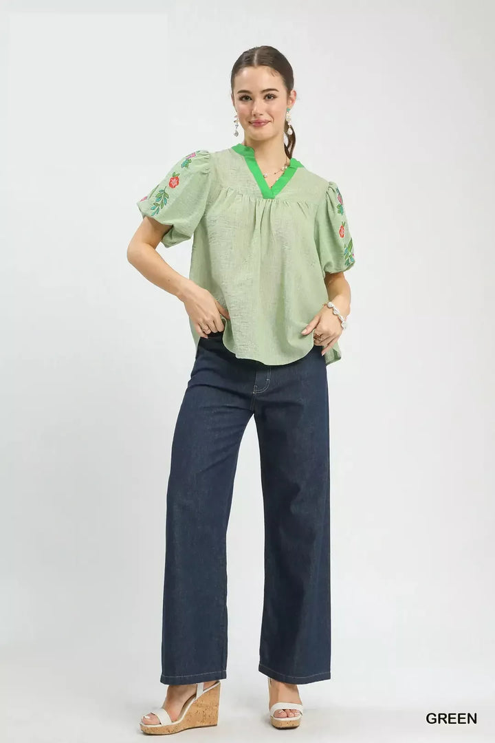 Floral embroidered puff sleeve top with split V-neck