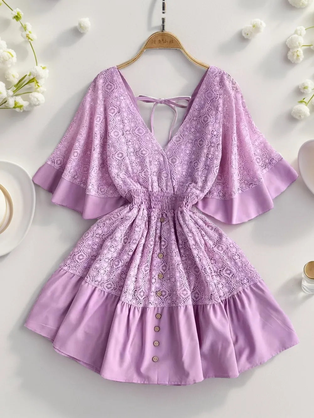 Lavender Ruffle-hem tie-back lace mini dress with flutter sleeves