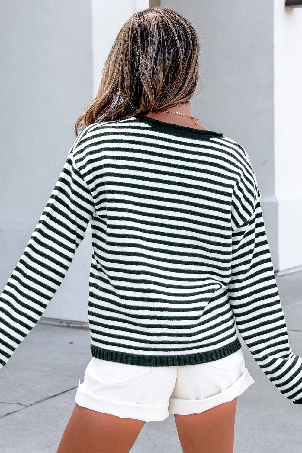 Striped drop shoulder henley sweater with button placket