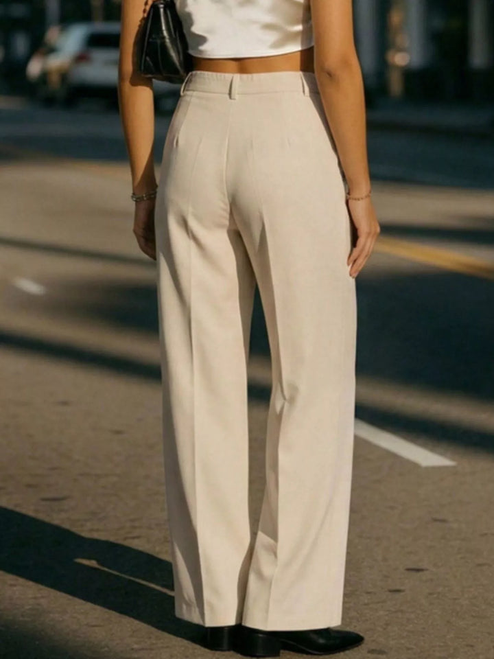 Pleated high-rise wide-leg trousers with side pockets