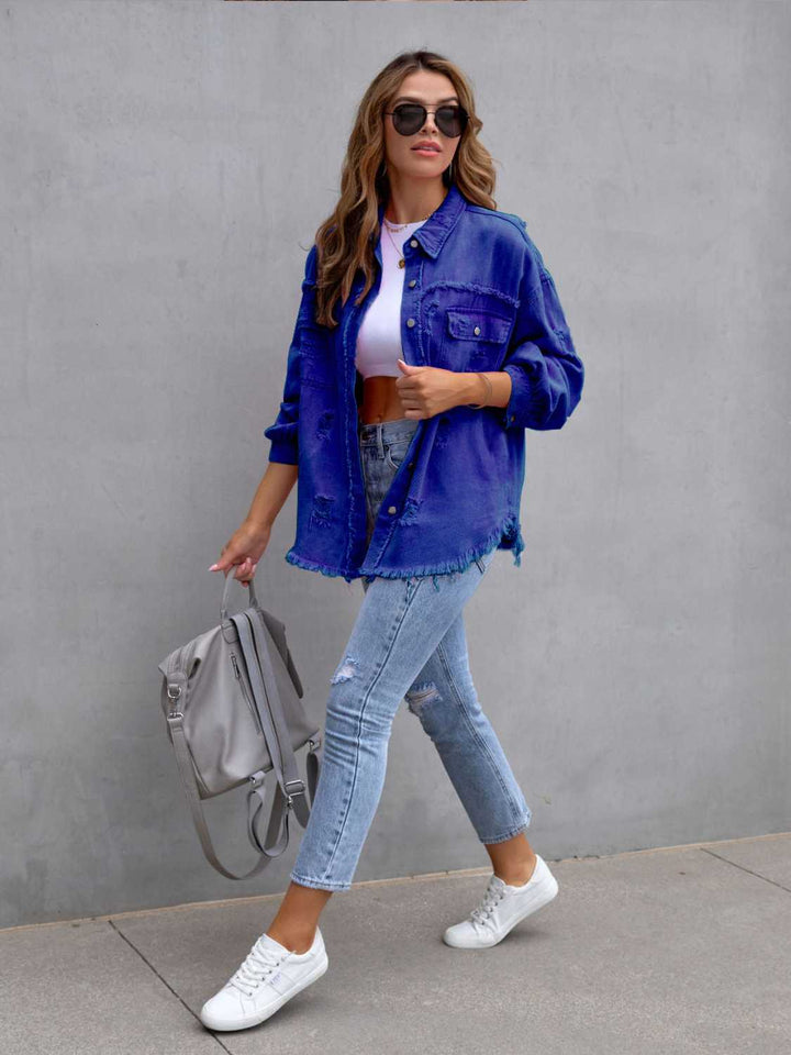 Distressed drop shoulder denim jacket with fringe hem