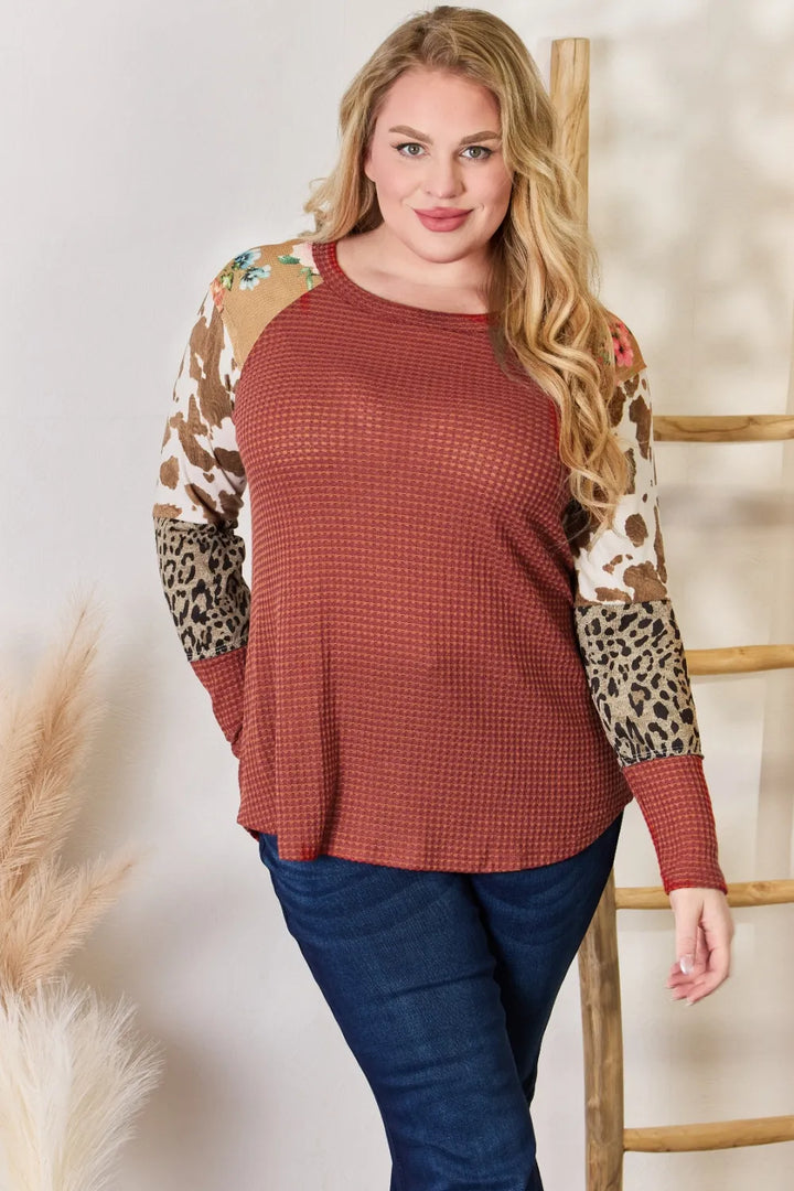 Waffle-knit top with leopard and floral print sleeves