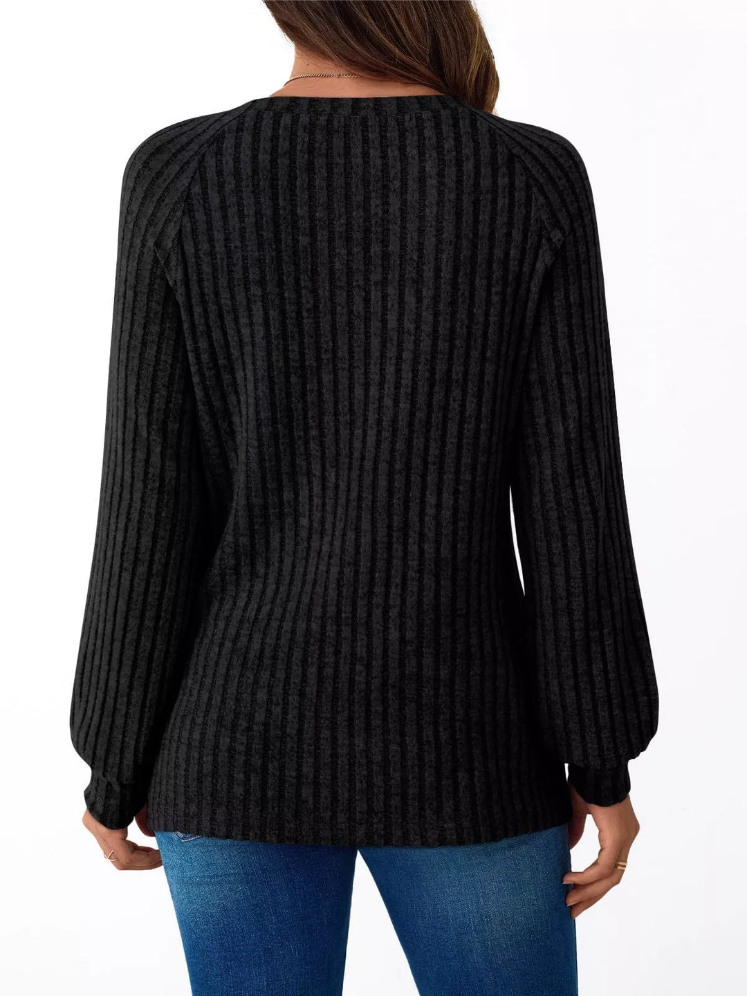 Ribbed knit long sleeve top with decorative shoulder buttons