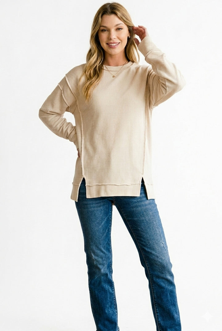 Ribbed exposed-seam pullover sweatshirt with side slits