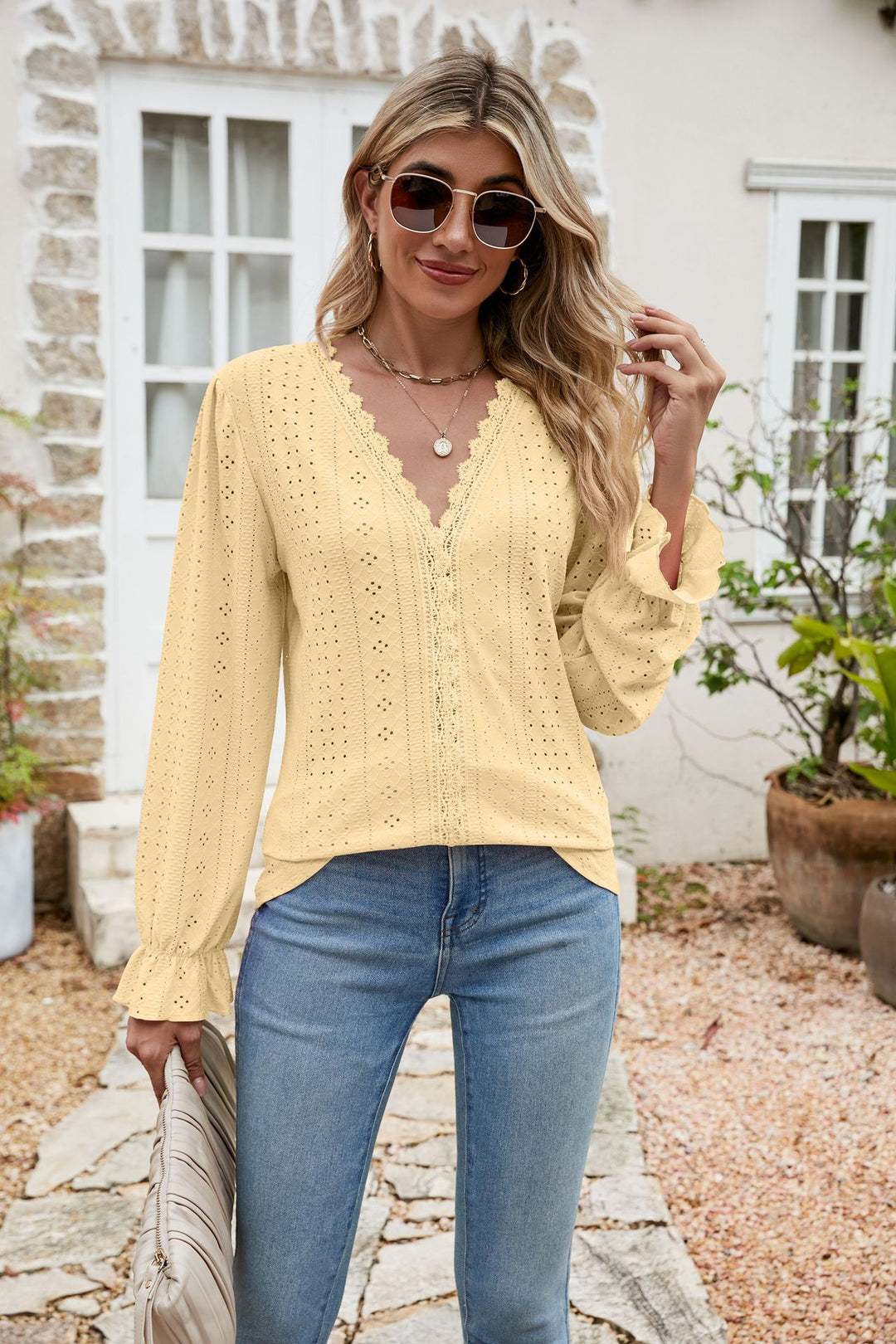 Eyelet lace-trim V-neck blouse with flounce sleeves