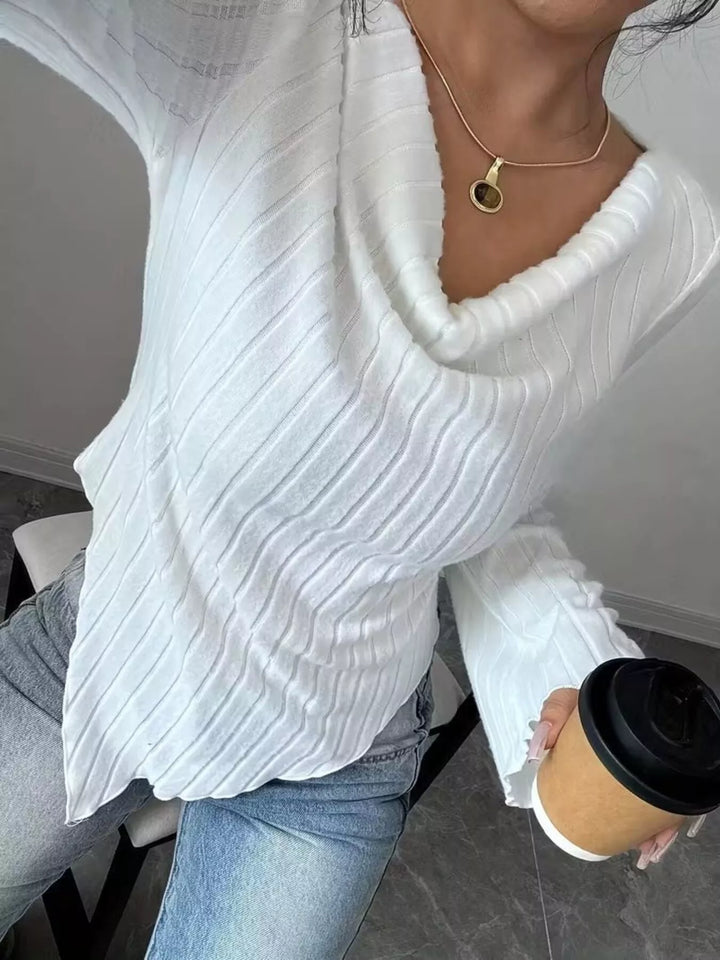 Ribbed knit cowl neck top with asymmetric hem and flared sleeves