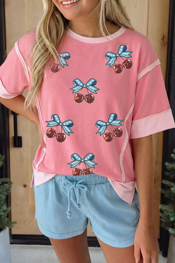 Dusty Pink Sequin cherry and bow graphic raw seam crew neck top