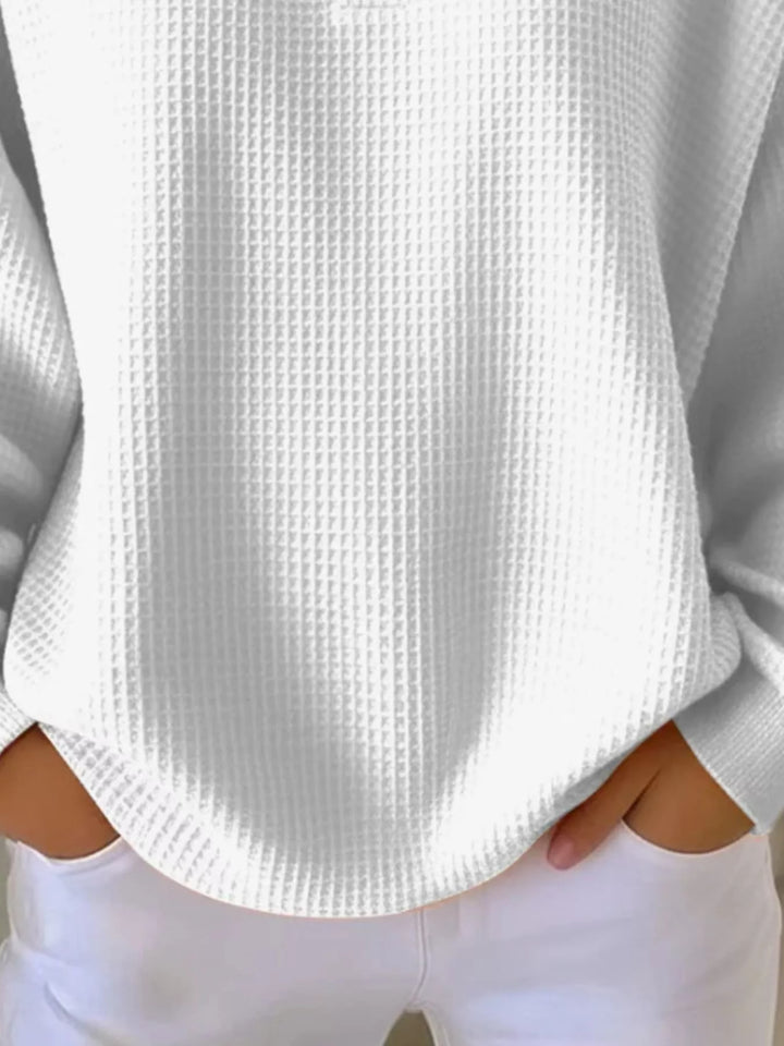 Waffle knit henley top with button placket and long sleeves