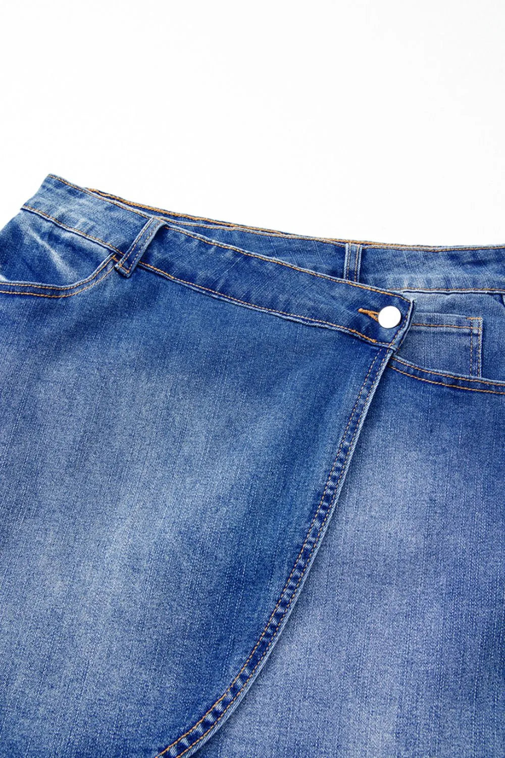Wrap-front denim mini skirt with angled hem seam