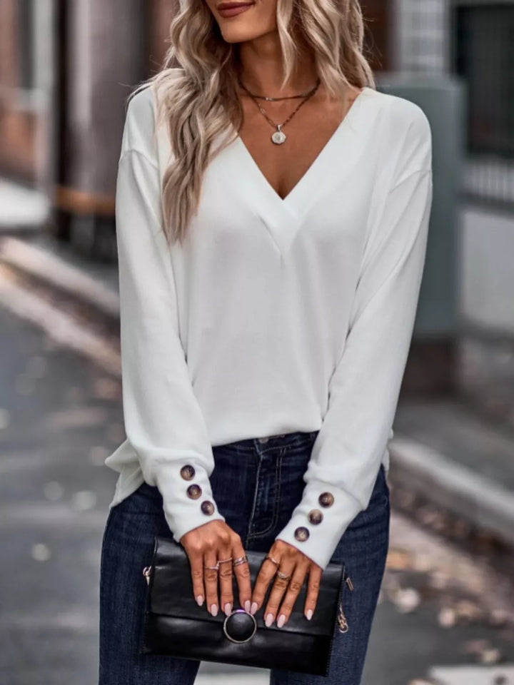 V-neck long sleeve top with button cuffs