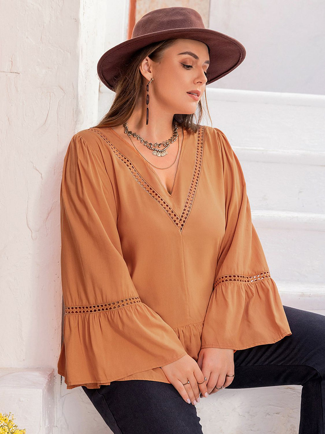 Plus size crochet-trim V-neck peplum blouse with flare sleeves