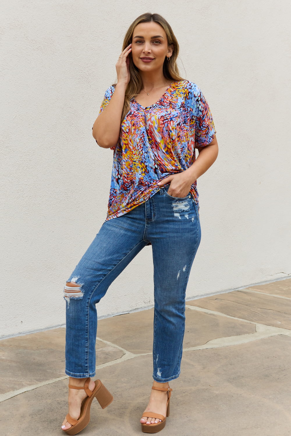 Abstract print dolman sleeve flowy V-neck top