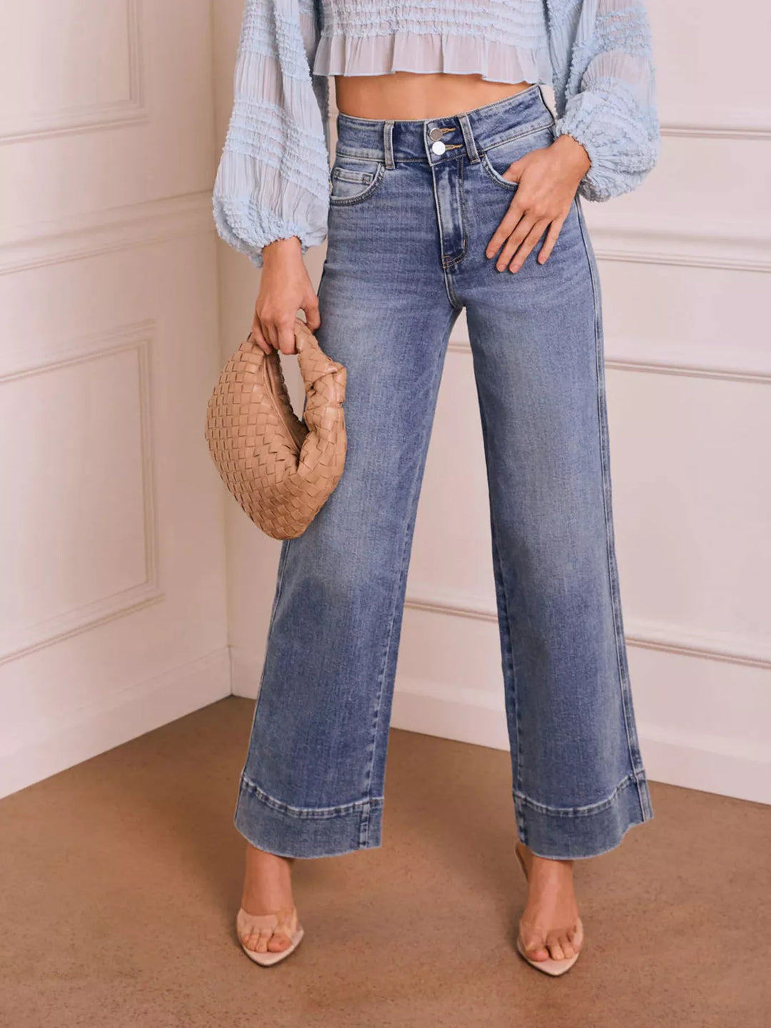 Washed high-rise wide-leg jeans with released hem