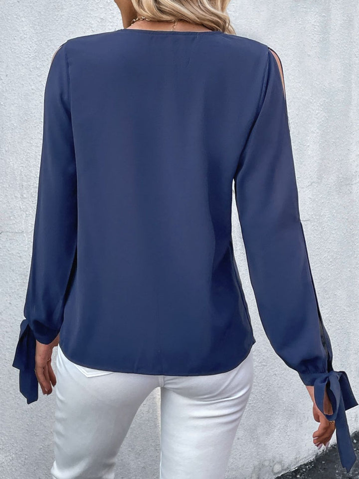 Crochet-trim V-neck blouse with slit tie-cuff sleeves